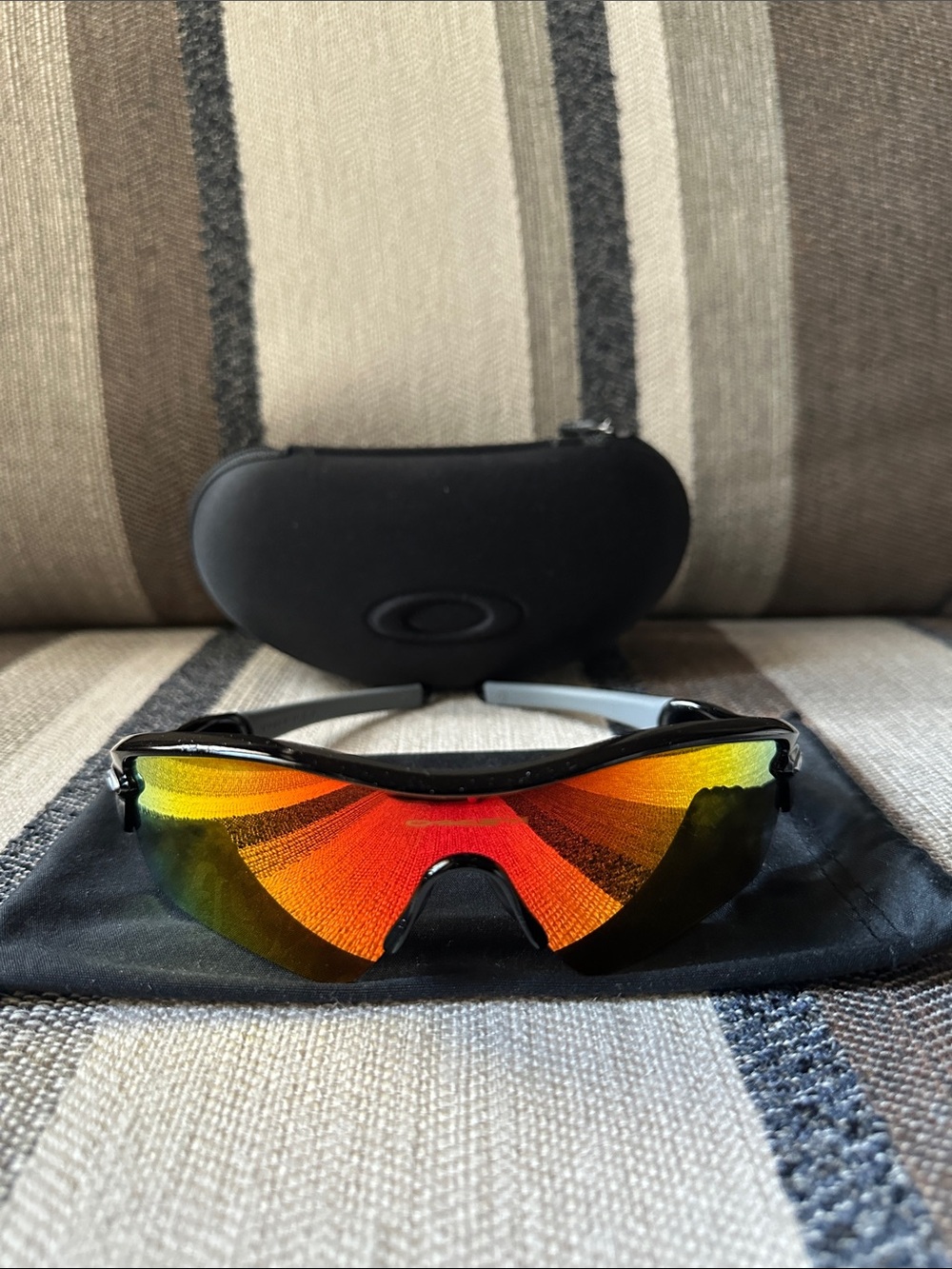 Oakley Black Frame Sunglasses with Red and Yellow Mirrored Lens
